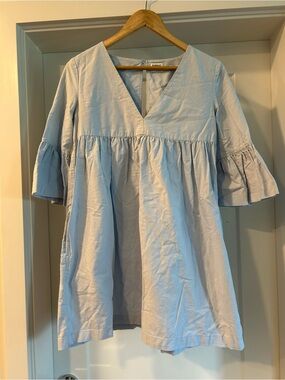 Sunday Best Babydoll mini dress with bell sleeves & pockets in baby blue colour